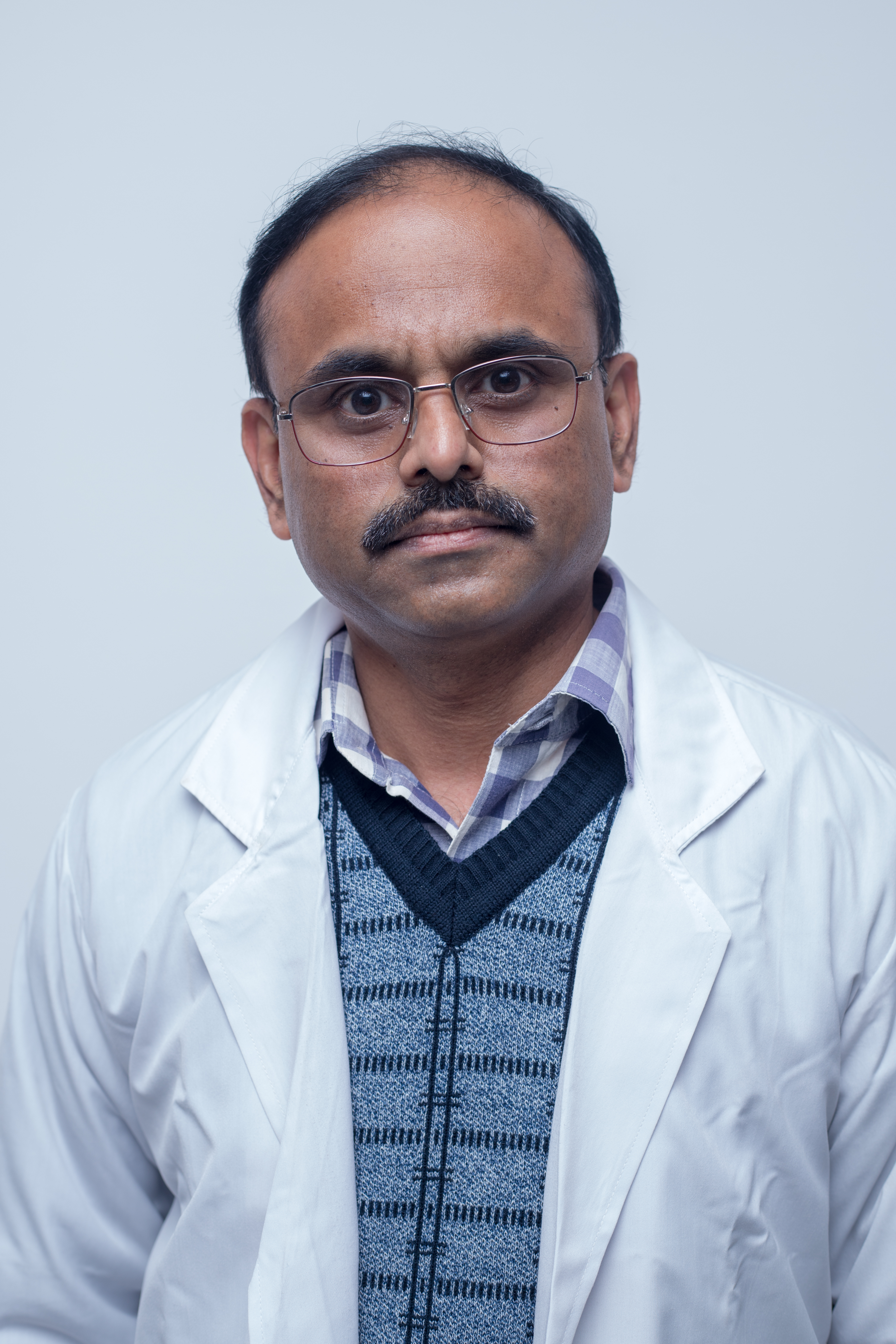 Dr.  Shripad J Walavalkar 